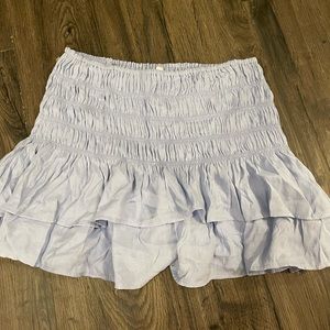 cinched blue skirt bought from a boutique